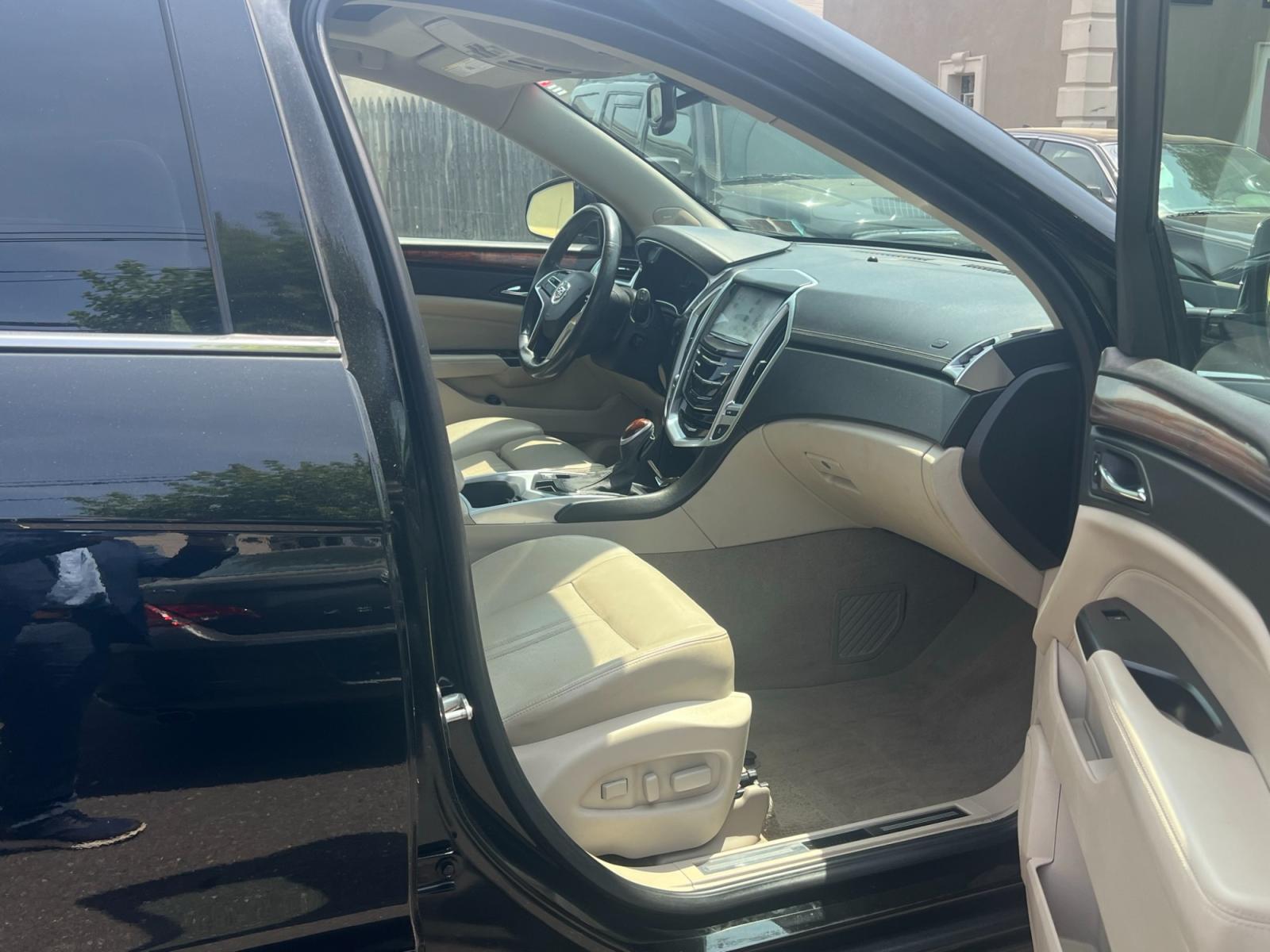 2013 BLACK /Beige leather Cadillac SRX (3GYFNGE37DS) , located at 1018 Brunswick Ave, Trenton, NJ, 08638, (609) 989-0900, 40.240086, -74.748085 - Can you say "Brand New" because that is exactly what this vehicle is.. Brand new in every way with only 29k Miles on it!! A must see in every way! - Photo #25